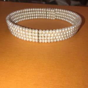 Faux pearl choker.